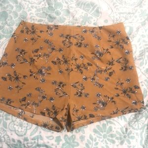 Silky shorts (cotton/spandex) but very flowy. Side zipper.